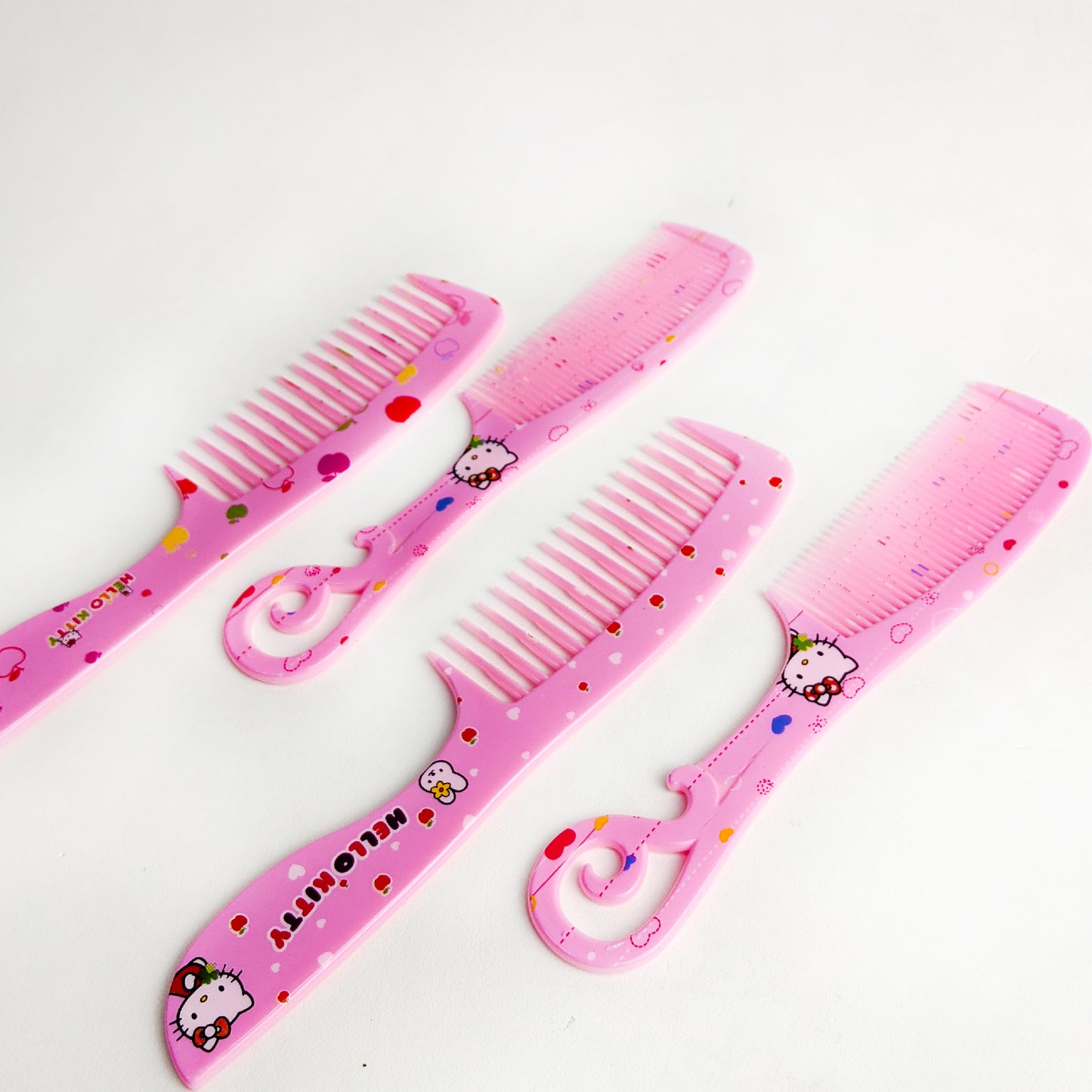 Pack Of 4 Pink Hair Combs