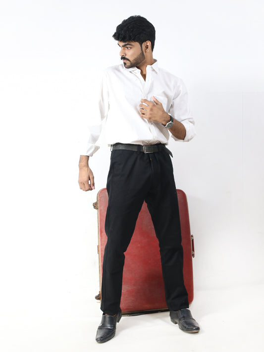 man standing in formal clothes, suspenders making poses with his suit  (photo 1/6) Stock Photo