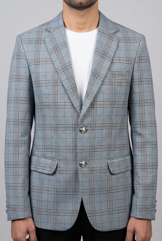 Close-up of the light grey checked coat on a model