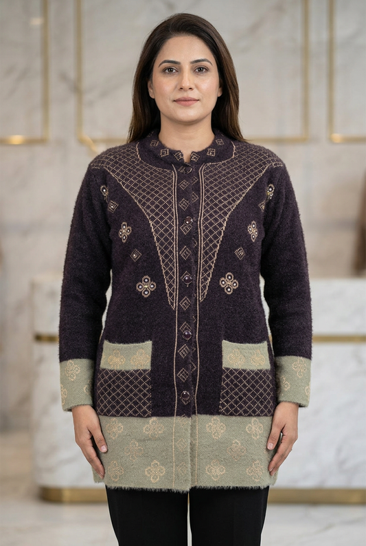 Woman wearing WSW114 dark plum-toned full-sleeve sweater with gold-tone lattice, two pockets and pale contrasting cuffs and hem