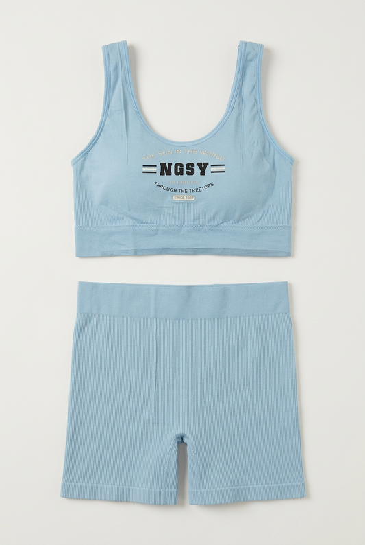 LB105 sky blue ribbed sports bra with black NGSY print and matching boyshorts, product-only flat lay.