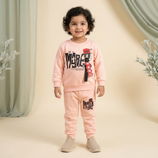 Pakistani child model approximately three years old wearing BS776 light peach shirt and trouser suit
