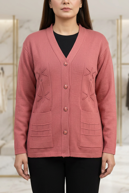 Woman wearing WSW109 pink full-sleeve V-neck sweater with beaded motifs, button front and two patch pockets