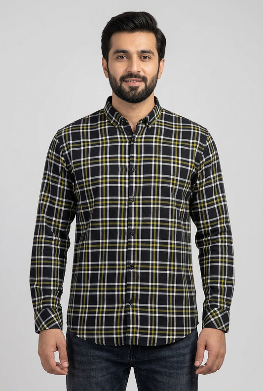 Pakistani male model wearing the black checked casual shirt